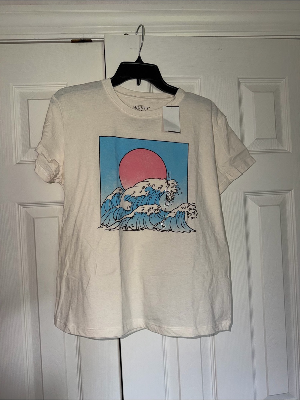 Mighty Fine Cream Short Sleeve Tee with Pink Sun and Blue Wave Graphic